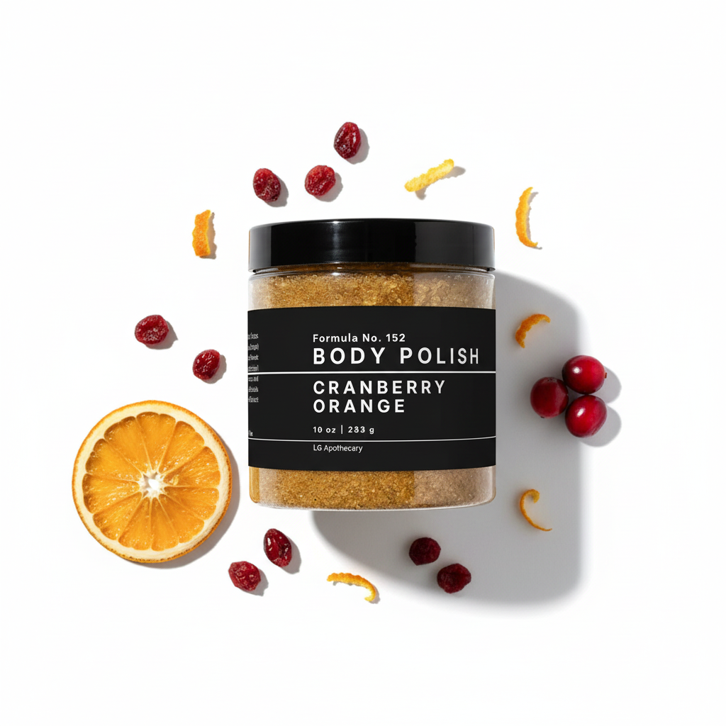 Jar of cranberry orange body polish with oranges and cranberries on a white background