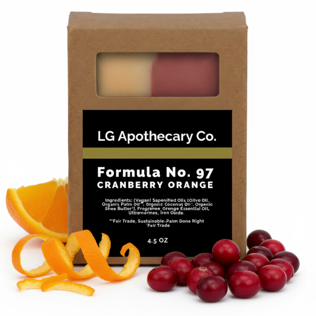 LG Apothecary Co. Formula No. 97 Cranberry Orange soap bar with cranberries and orange peel on a white background