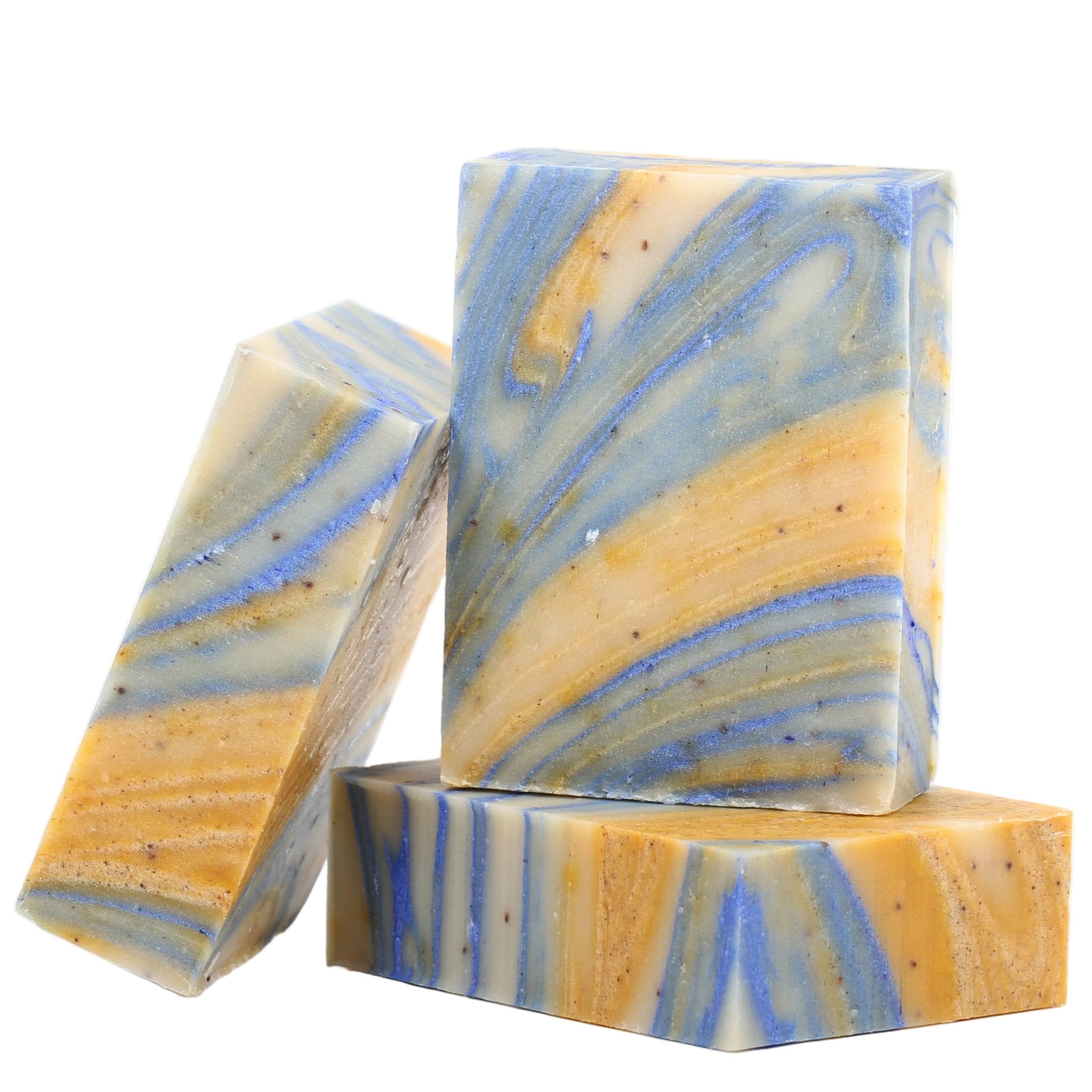 Three bars of marbled soap with blue and yellow swirls on a white background lg apothecary co